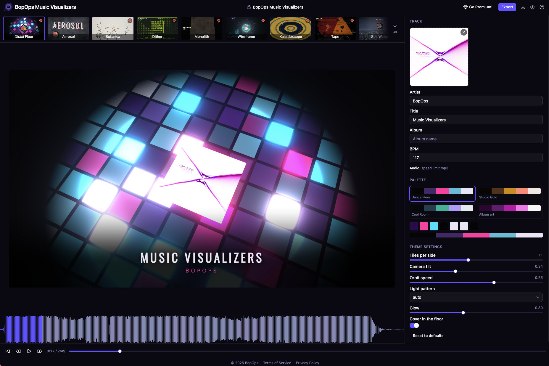 The BopOps Music Visualizers editor with a Disco Floor visualization rendering around the album cover, the theme strip along the top, and track, palette and theme controls on the right